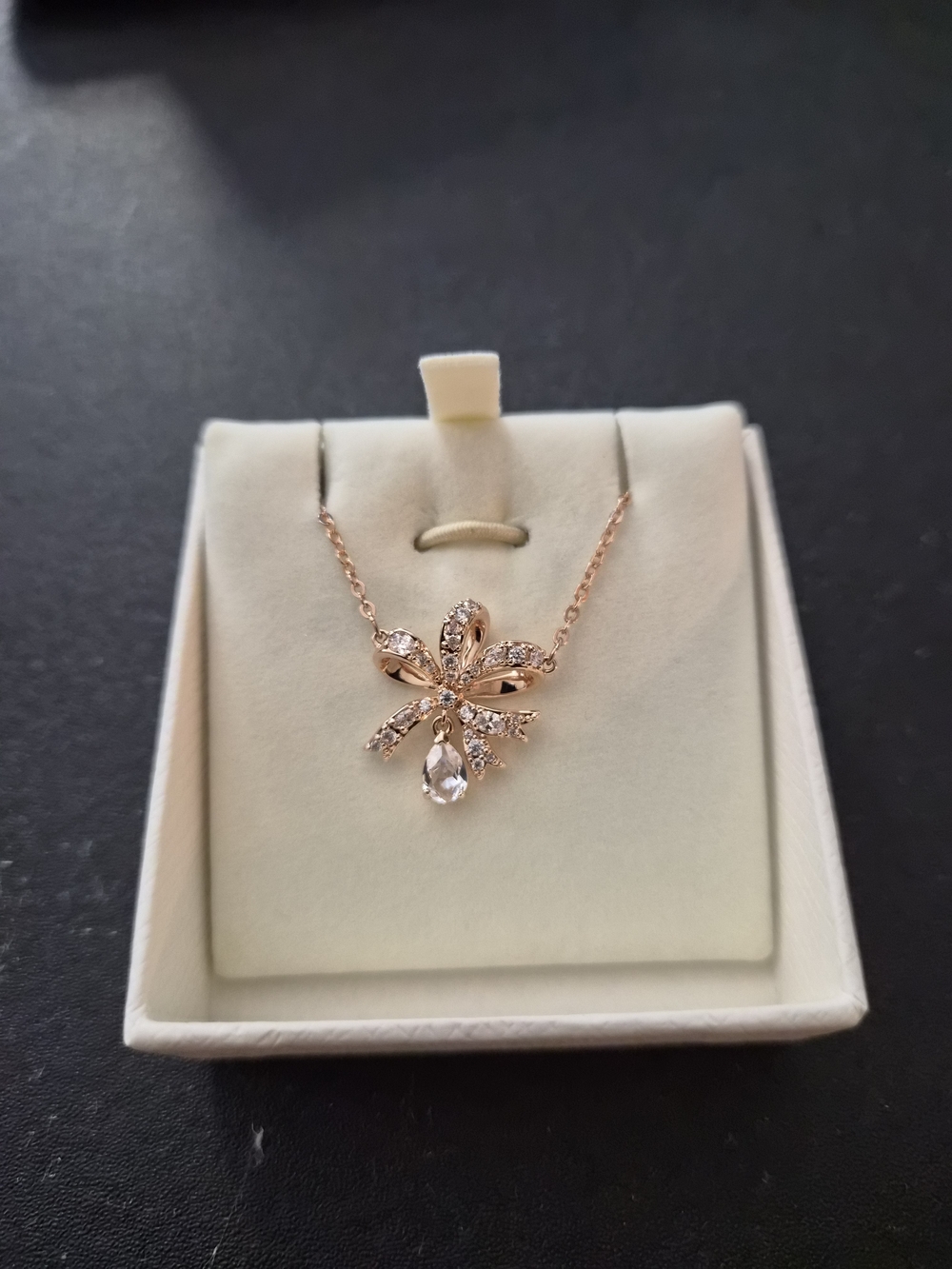 Delicate Rose Gold Bow Pendant Necklace with Crystal Accent